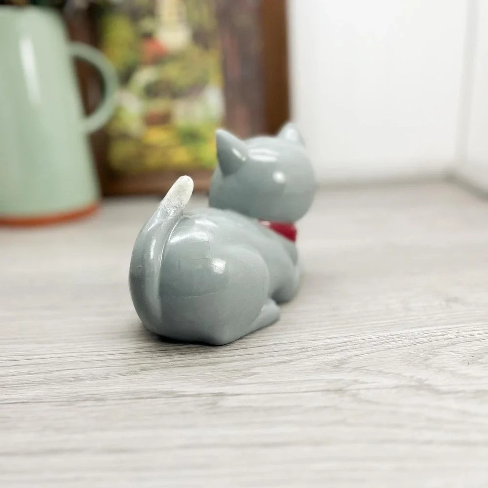 Vintage Gray Porcelain Cat Figure with Red Bow
